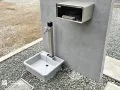 生活感を隠すひと工夫。立水栓は門柱裏でスマートに