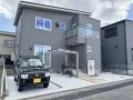 玄関アプローチがひと際目を引くナチュラルテイスト新築外構
