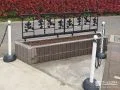 キャラクターモチーフのフェンスがアクセントの植栽スぺース工事