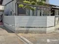 ホワイトフェンスが爽やかでお手入れの手間を抑える外構工事