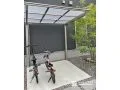 スタイリッシュなフラット屋根で自転車を守るサイクルポート工事