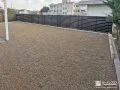 ナチュラルなカラーの砂利を敷設して温かみのあるお庭に