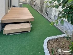 緑鮮やかな主庭とスロープ付きの駐輪スペースリフォーム工事