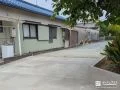 すっきちと整えた駐車スペースと畑の土の抽出を防ぐ土留め工事