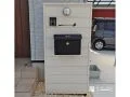 玄関まわりを品よく彩る、木調デザインの機能門柱