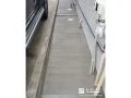 犬走りにコンクリートを打設し日々のお手入れを軽減した工事