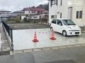 駐車スペースの舗装をメッシュフェンス設置外構リフォーム工事