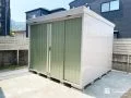 グリーンの本体カラーが美しい物置