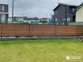 片面木目調のフェンスをセレクトし効率よく目隠しをした工事