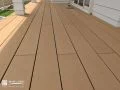 玄関ポーチから庭を自然に繋ぐウッドデッキ