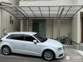 カーポートとアプローチを調和させた機能的で美しい外構工事
