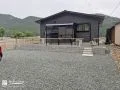 お庭と駐車スペースをつなぐ裏側の外構