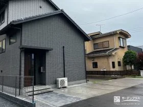 スタンプ仕上げのコンクリートで個性を演出したアプローチ工事