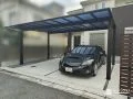 広々駐車スペースにカーポートと目隠しフェンス設置した工事