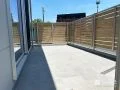 タイルデッキと目隠しフェンスでプライベート空間をつくった工事