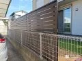 木目調フェンスで道路からの視線をカットしたリフォーム工事