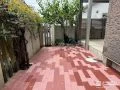 前庭を赤系を組合わせたインターロッキングで快適に整えた工事