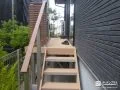 木目調フェンスとデッキで快適なプライベート空間を整えた工事
