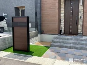 モダンな印象の機能門柱で玄関まわりを美しく便利に整えた工事