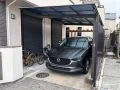 お車を守るカーポートとお庭を彩る木製パーゴラの設置工事