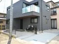 アプローチと駐車スペースにコンクリートを打ち足元を整えた工事