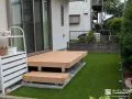 人工芝とデッキで快適に過ごせるお子様の笑顔あふれるお庭工事