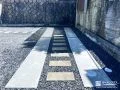 飛び石状のコンクリートでアクセントをつけた駐車スペース工事