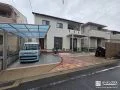 すっきりとオープンな駐車スペースとお庭のリフォーム工事