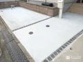 土間コンクリートにピンコロ目地を取り入れた駐車スペース工事