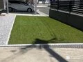 インターロッキング見切りで整えた人工芝の前庭リフォーム工事