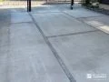 ピンコロ石で仕上げた駐車スペースの可愛らしいアクセント工事