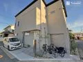 ロックガーデンが彩るナチュラルモダンな新築外構