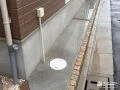 可愛らしいレンガで縁取りを施した犬走りの土間コンクリート工事