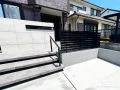 大判タイルが際立つモダンな門まわり