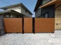 木目が映える門扉とフェンスで、やさしく守るお庭の入り口