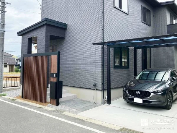 黒の外壁に映える限られたスペースを美しくまとめたモダン新築外構
