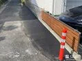 敷地境界をアスファルトで舗装し雑草対策を施したリフォーム工事