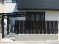 統一感あるデザインの目隠しフェンスとサイクルポート設置工事