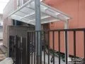 ホワイトのフレームが爽やかなサイクルポートを設置した工事