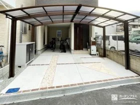 落ち着いた色調で統一させて仕上げたカーポートと物置の設置工事