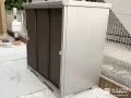 ダークブラウンカラーで落ち着いた印象に仕上がっている物置工事