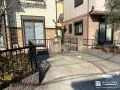 落ち着いた印象のお住まいにすっきり溶け込む縦格子フェンス工事