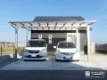 フラット屋根が映える開放感のある駐車スペース