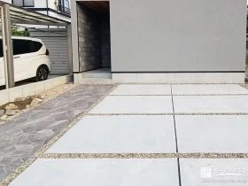 上品な石張りのアプローチがお住まいのアクセントになった工事