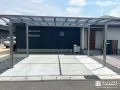 熱線吸収タイプの屋根が心地よい日陰をつくるカーポート設置工事