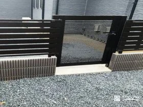 動線をスマートにつなぐ、横格子デザインの通用門扉[施工後]