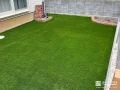 お子様がのびのび遊べる人工芝と物置を整えたお庭づくり工事