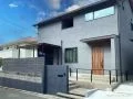グレーの外観に合わせたシックでモダンな新築外構