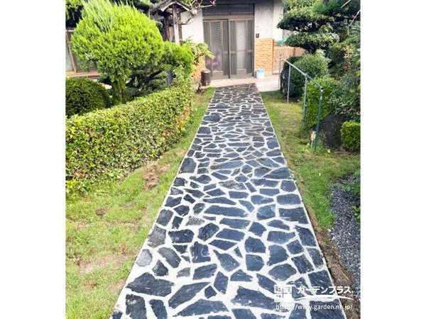 天然石のアプローチで魅せる、安心と美観を両立した外構リフォーム工事