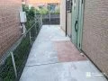 【施工後】土間コンクリートでフラットに舗装したアプローチ
